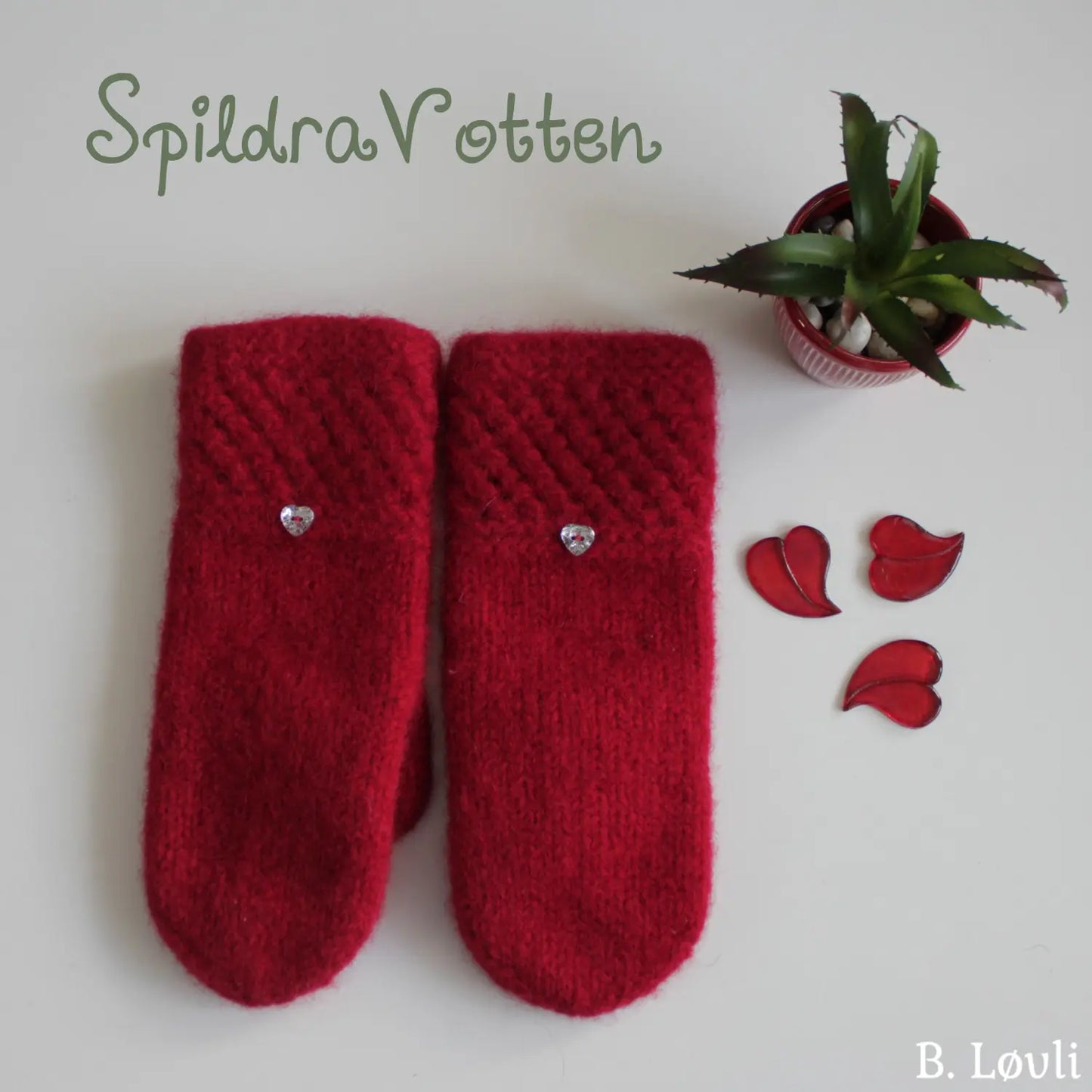 Spildra tova votter vist som julevotter liggende