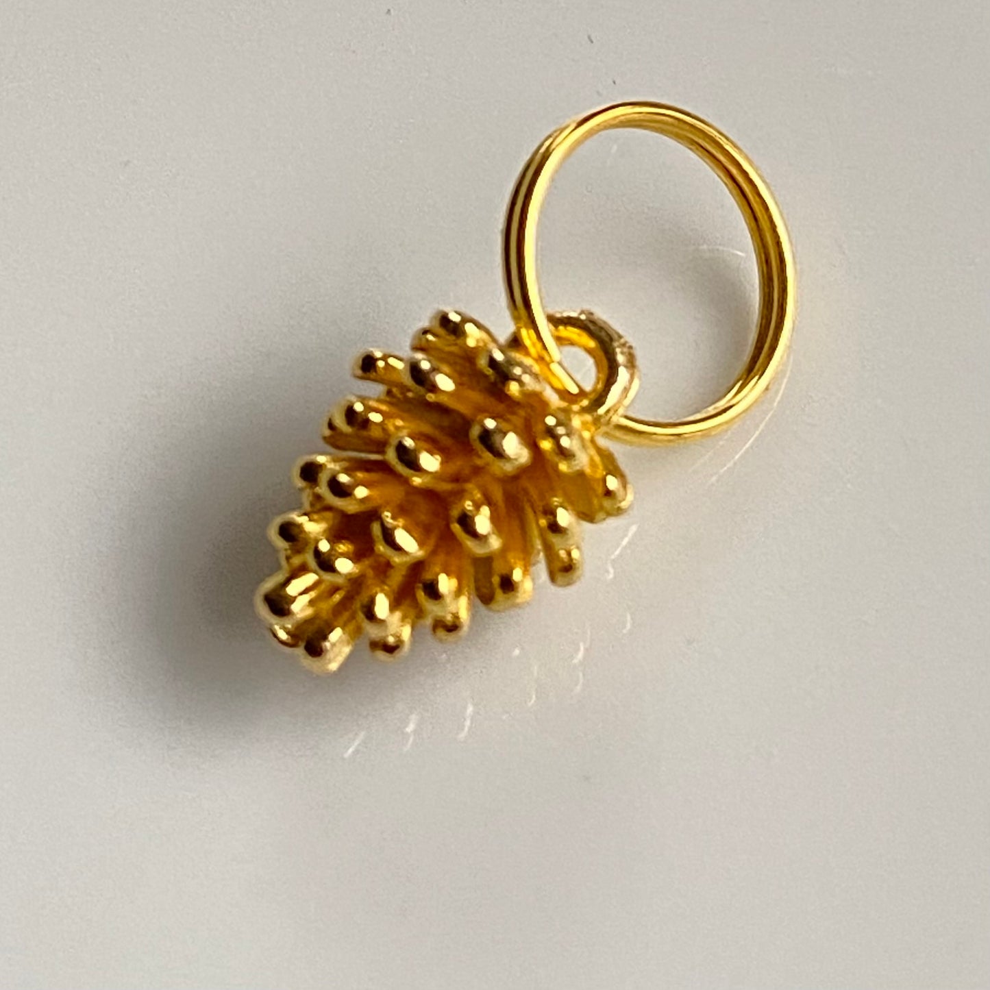 Maskemarkør - Kongle gullfarget