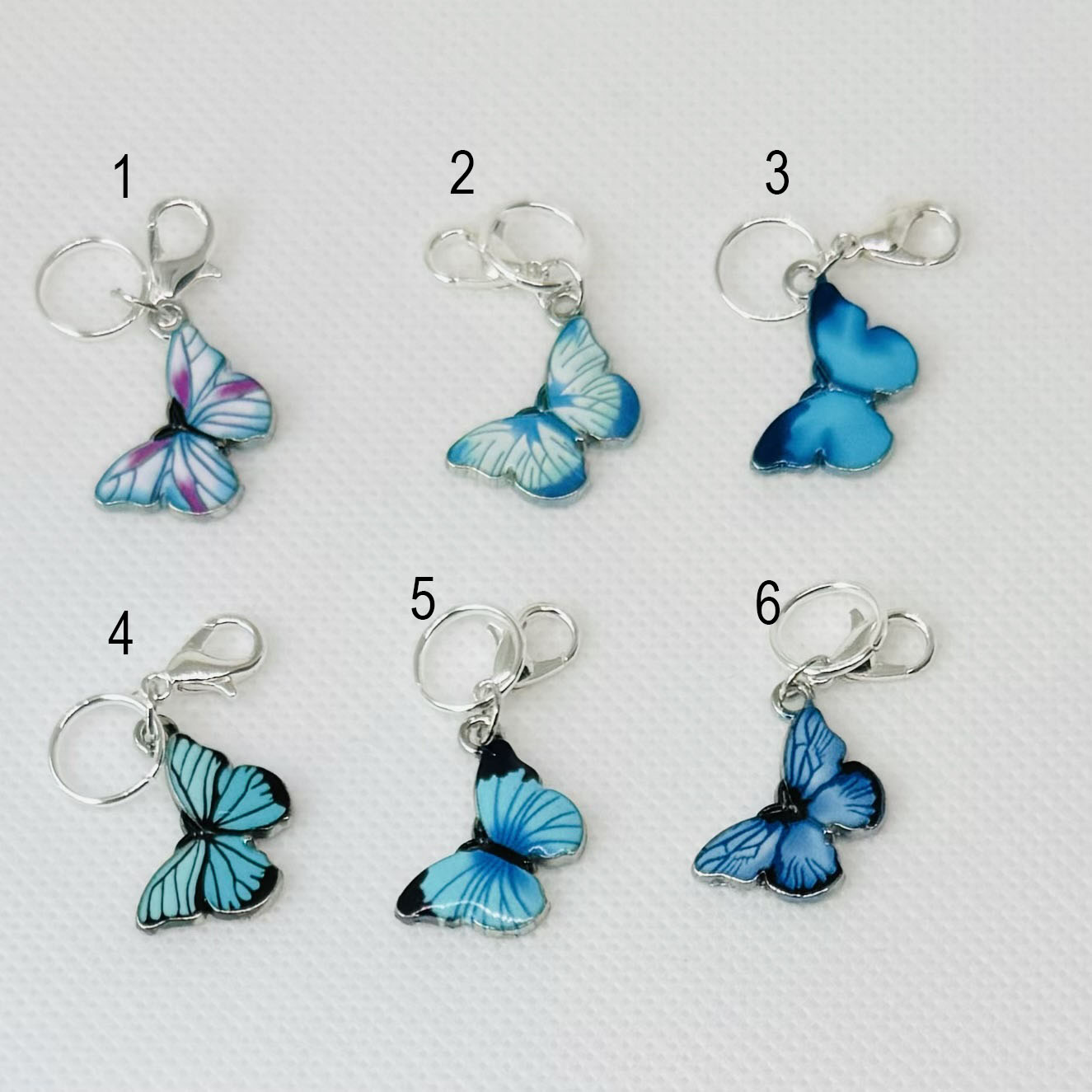 Sommerfugl maskemarkører i sølvnyanser - blå