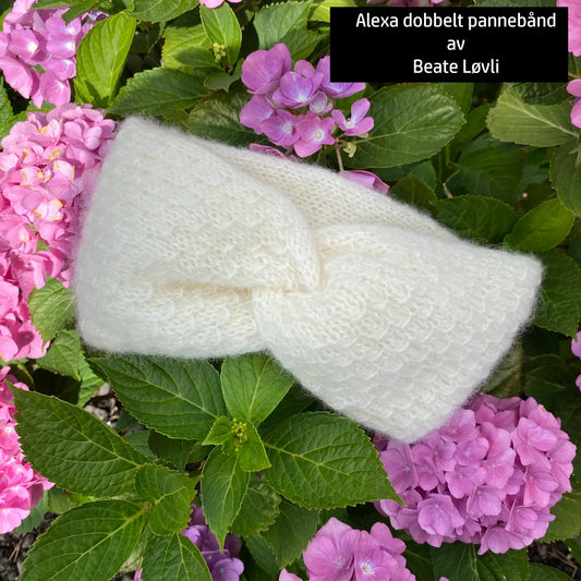 Alexa tova dobbelt Pannebånd iggende på kontrastrike blomster for å skape stemning