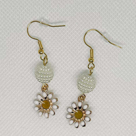 Hvit blomst ørekroker