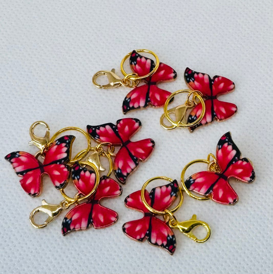 Sommerfugl maskemarkører i gullnyanser