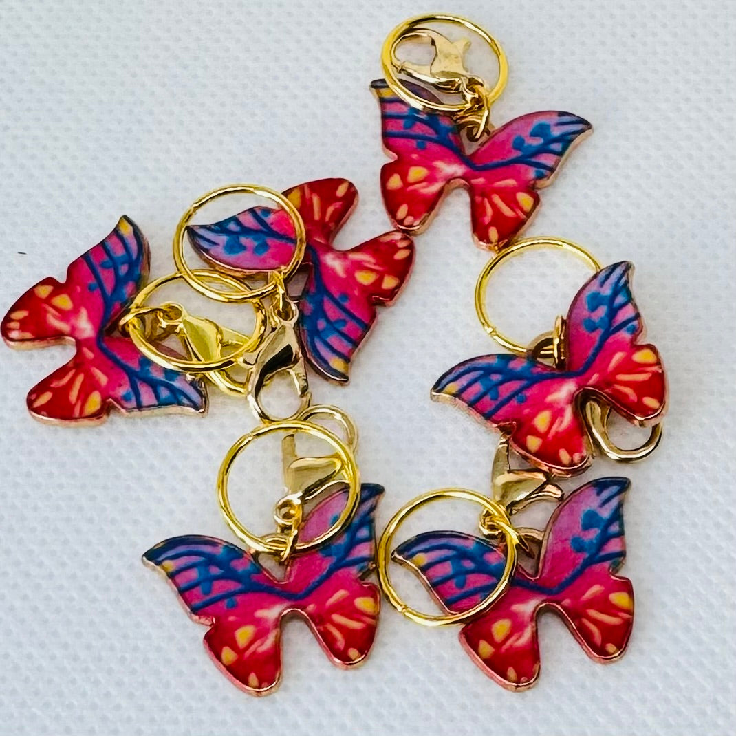 Sommerfugl maskemarkører i gullnyanser