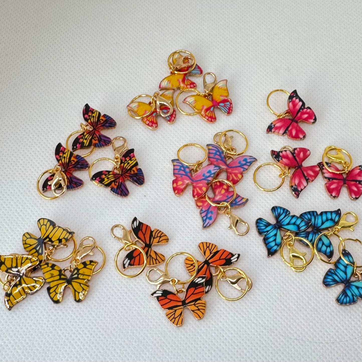 Sommerfugl maskemarkører i gullnyanser