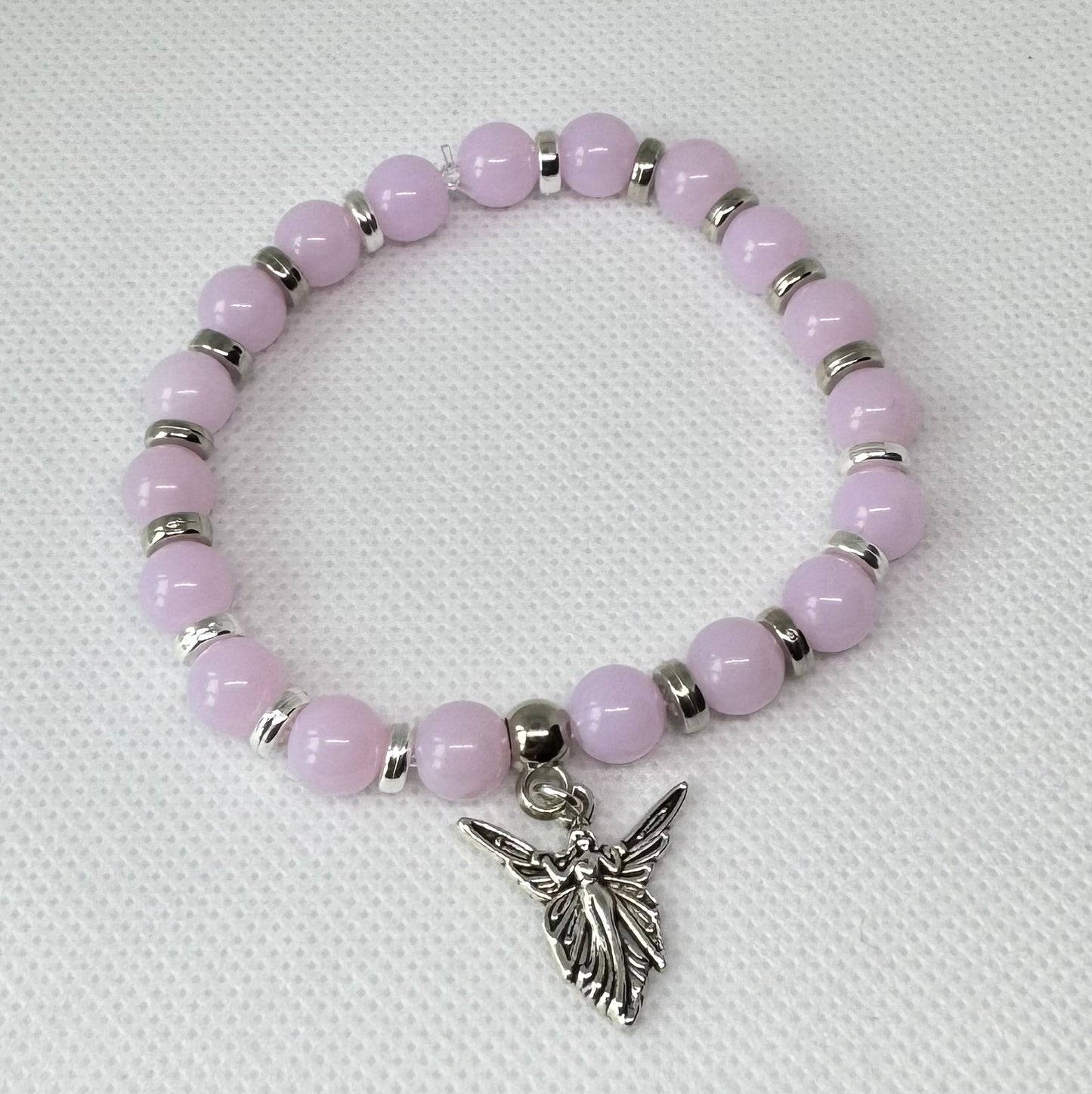 Lys lilla armbånd med hage fe