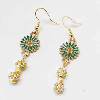 Blomst i grønt og gull farger