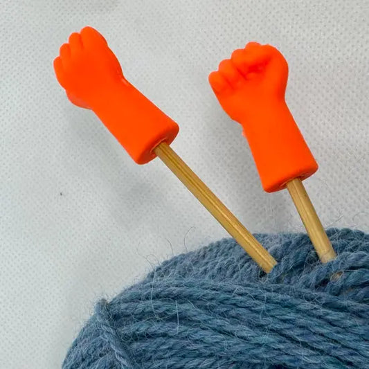 Maskestoppere med knyttneve i orange