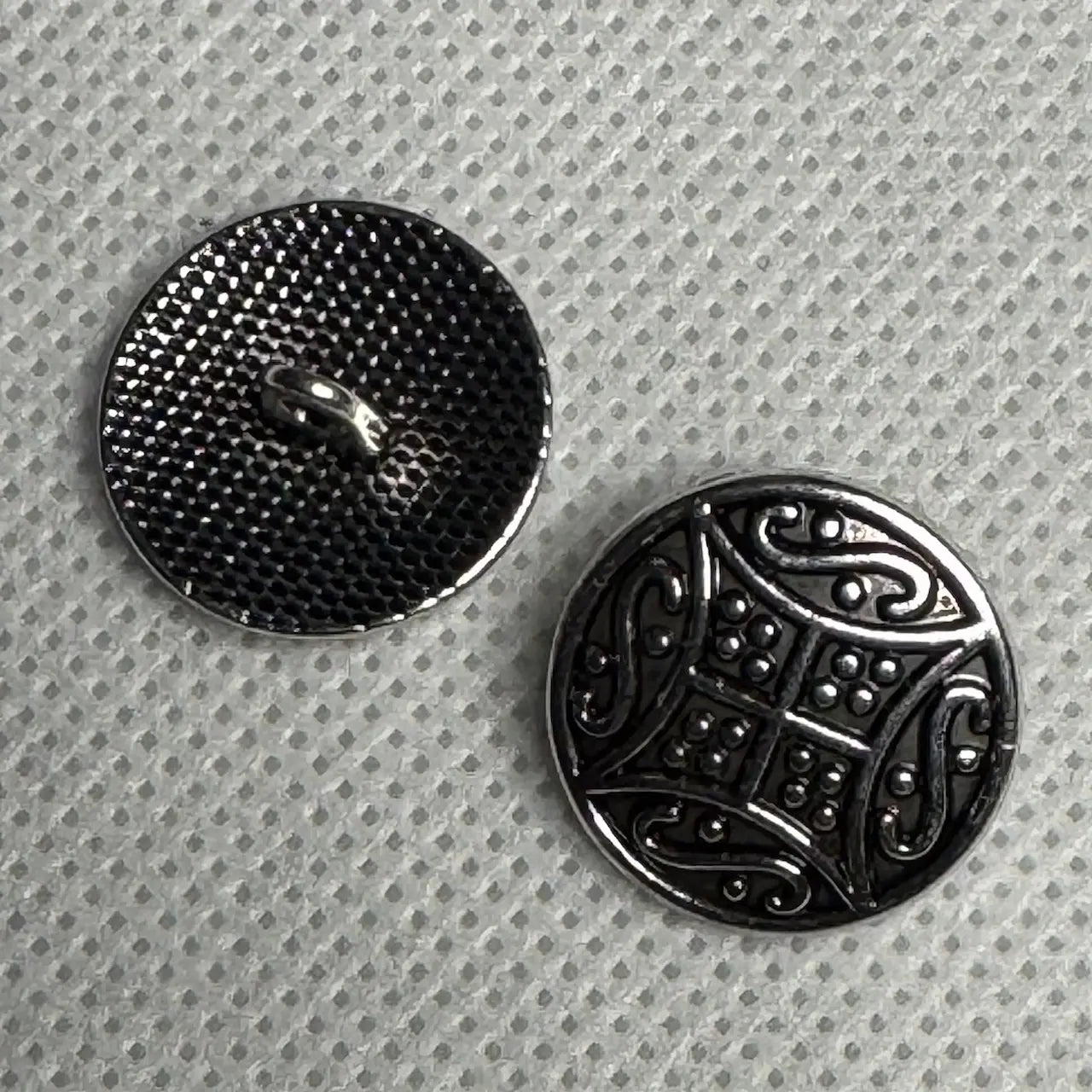 Metallkanpper detalj av knappene