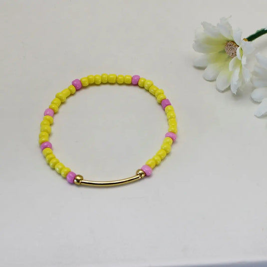 Rosa og gul enkelt armbånd