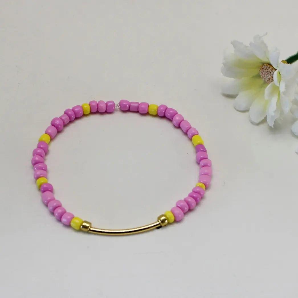 Rosa og gul enkelt armbånd
