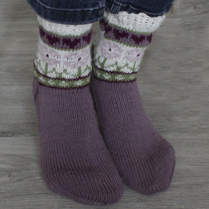 Elegante strikket sokker med delikat mønster i lys farge