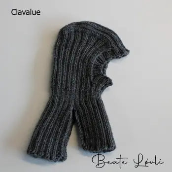 Clavalue Barnelue vist liggende flatt på bord vist fra siden